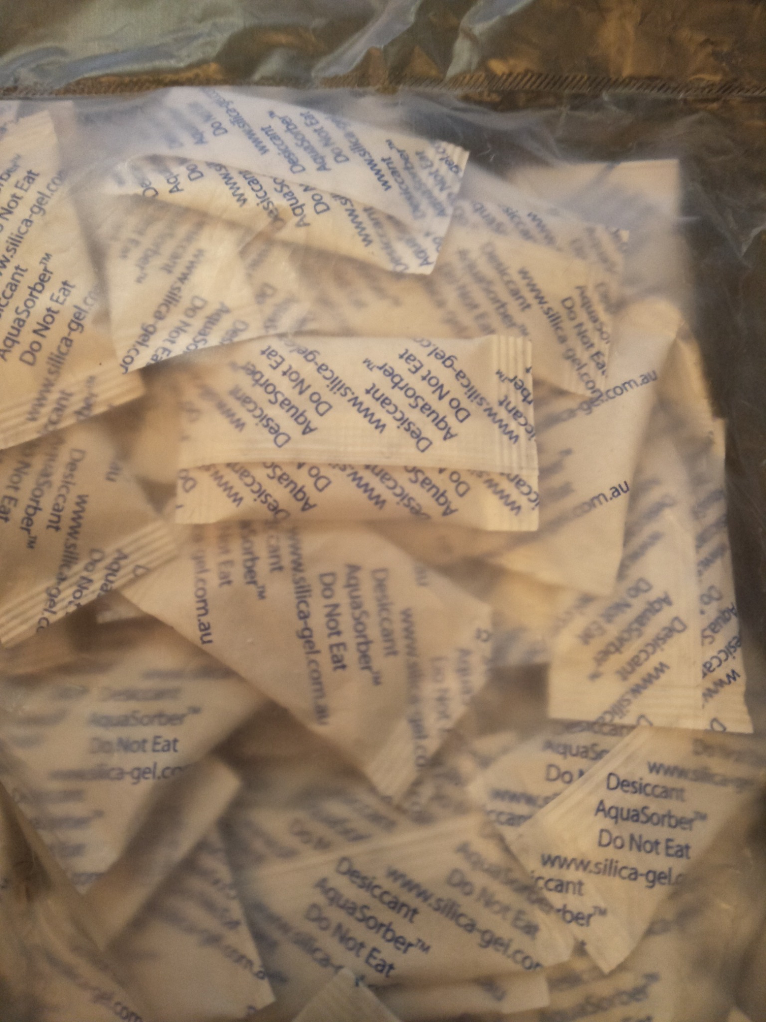 AquaSorber silica gel desiccant sachets in bulk packaging